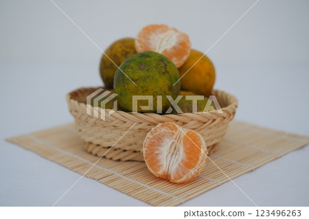 Fresh Citrus Delight in a Woven Basket 123496263