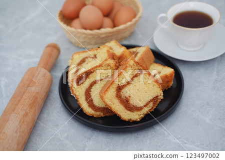 Delicious Marble Cake with a Cup of Black Coffee Delicious Marble Cake with a Cup of Black Coffee 123497002