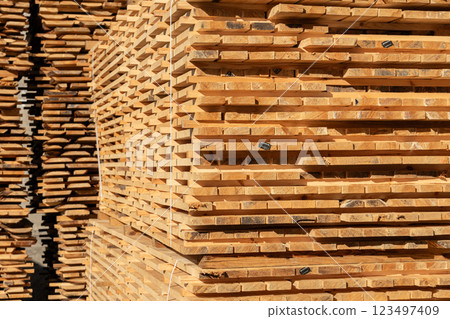 Edged boards. Building material. Warehouse and lumber shop 123497409
