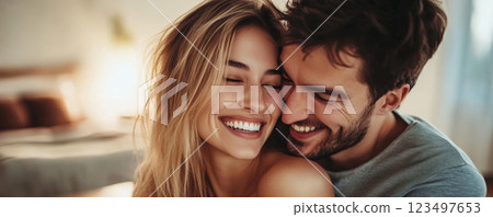 Tender moment between couple embracing at home 123497653