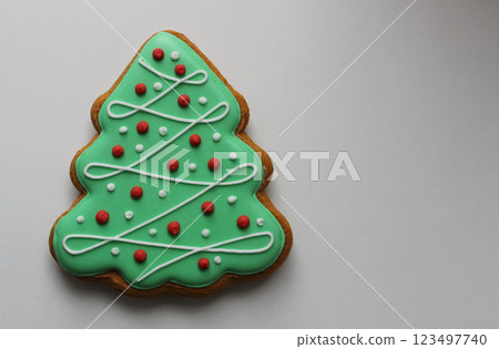 Shortbread Cookie In Pine Tree Shape With Colored Icing Isolated On White Concept Design For Greeting Card  123497740