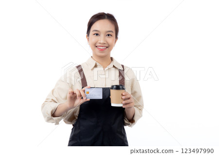 Portrait happiness young asian woman wearing apron holding credit card isolated white background. 123497990