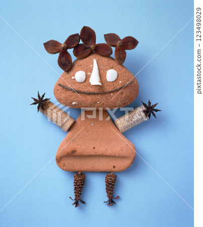 Expressive stone characters drawn with natural materials Expressive stone characters drawn with natural materials 123498029