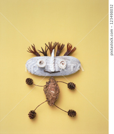 Expressive stone characters drawn with natural materials 123498032