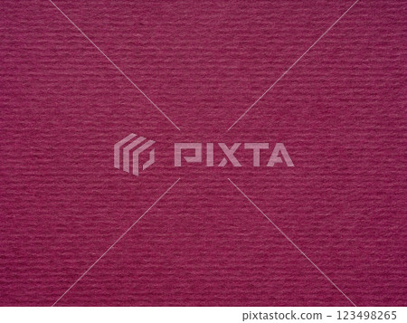 Bathed in burgundy, this paper's texture suggests a blend of luxury, mystery, and the allure of the unknown 123498265