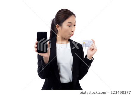 Portrait young asian businesswoman holding credit card and smartphone satisfaction isolated. Portrait young asian businesswoman holding credit card and smartphone satisfaction isolated. 123498377