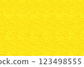 Textured yellow background material 123498555