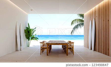A wooden table and chairs on a wooden deck overlooking the ocean A wooden table and chairs on a wooden deck overlooking the ocean 123498647