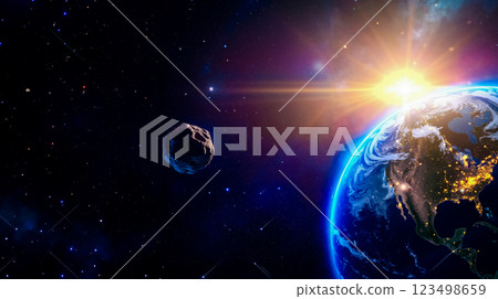 A view of the earth and an asteroid in space 123498659