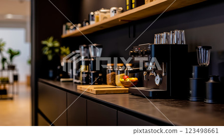 A coffee machine sitting on top of a counter in a coffee shop 123498661