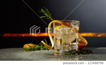Gin-tonic cocktail with lemon and rosemary. 123498790
