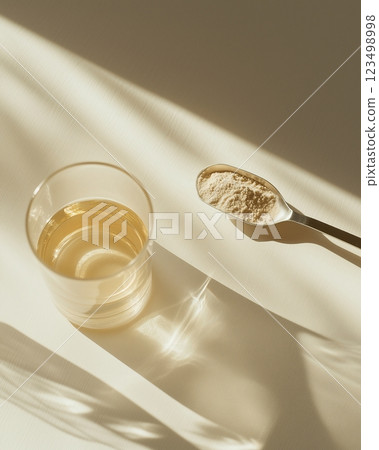 Protein powder and spoon 123498998