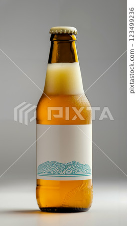 A bottle of beer with a white label on it 123499236