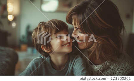 Happy Mother and Son Sharing a Loving Moment Indoors 123500261