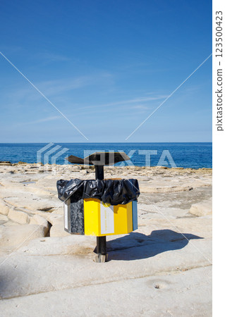 Garbage sorting can on Fond Ghadir beach on Malta 123500423
