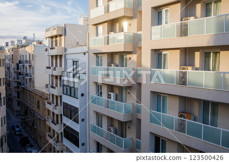 Street with modern buildings facades in Sliema, Malta 123500426