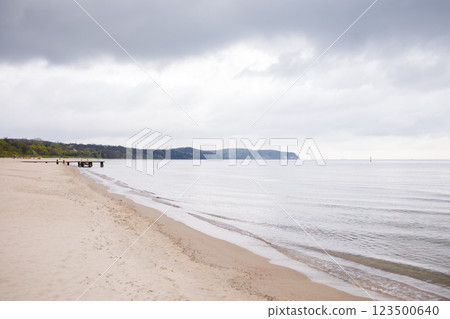Empty beach by the Baltic sea in Sopot in moody cloudy weather Empty beach by the Baltic sea in Sopot in moody cloudy weather 123500640
