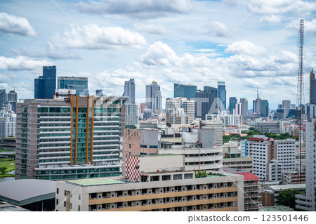 Bangkok Aerial Skyline and Skytrain view of Thailand. Business and financial building area centers with smart green park among urban city at noon time. 123501446