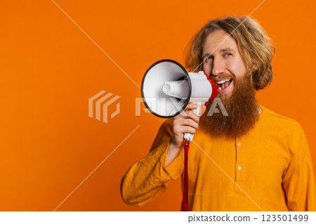 Caucasian man talking with megaphone proclaiming news loudly announcing advertisement discounts sale Caucasian man talking with megaphone proclaiming news loudly announcing advertisement discounts sale 123501499