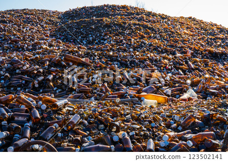 Mountains of empty brown bottles - Recycling 123502141