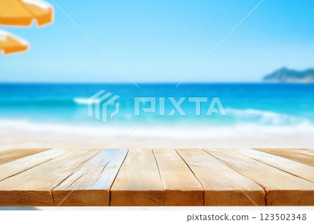 Wood table top on blurred blue sea and white sand beach background can be used for display or montage your products 123502348