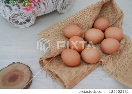 brown eggs on gunny sack brown eggs on gunny sack 123502381