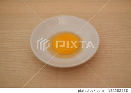 boiled egg on wood background boiled egg on wood background 123502388