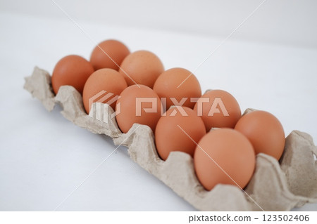 Eggs in a carton box Eggs in a carton box 123502406