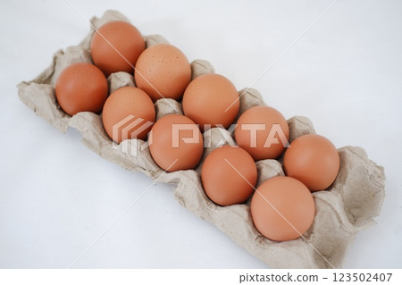 Eggs in a carton box Eggs in a carton box 123502407
