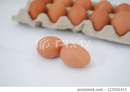 Eggs in a carton box 123502415