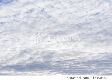 Uniform grey clouds background, Serene Cloudy Sky A Beautifully Peaceful Overcast Landscape That Invites Calmness 123503820