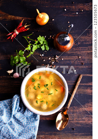 bowl with soup, fresh soup with meatballs and vegetables bowl with soup, fresh soup with meatballs and vegetables 123505673