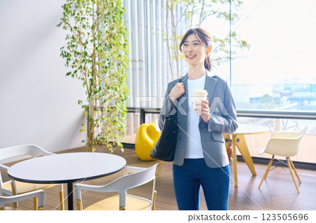 Businesswomen on their way to work. Photo courtesy of Sky Perfect Tokyo Media Center. 123505696