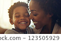 Loving Black Mother Embracing Son with Joyful Smiles 123505929