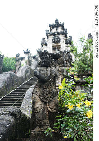 Ancient Ancient Hindu god angle decorated outdoor front arched entrance of stair at Pura Luhur Lempuyang temple is the art and culture of Hinduism in Bali of Indonesia. Asian destination travel Ancient Ancient Hindu god angle decorated outdoor front arched entrance of stair at Pura Luhur Lempuyang temple is the art and culture of Hinduism in Bali of Indonesia. Asian destination travel 123506309