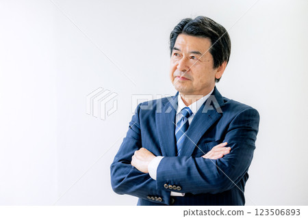 Senior man with arms folded 123506893