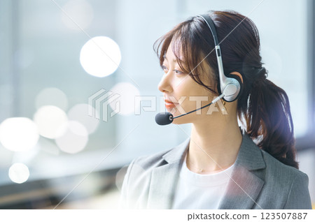 Female operator wearing an intercom Filming cooperation: SKY Perfect Tokyo Media Center 123507887