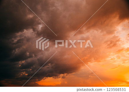 Sunset Cloudy Sky With Fluffy Clouds. Sunset Sky in pink orange colors Background. Dramatic Sky. sunrise Sunset In Yellow, Orange, Pink Colors Sunset Cloudy Sky With Fluffy Clouds. Sunset Sky in pink orange colors Background. Dramatic Sky. sunrise Sunset In Yellow, Orange, Pink Colors 123508531