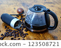 Black coffee and coffee grinder 123508721