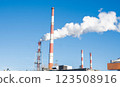 plant chimney smoke air pollution oil refinery building sky background 123508916