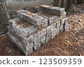 Many piled up gray stone pillars 123509359