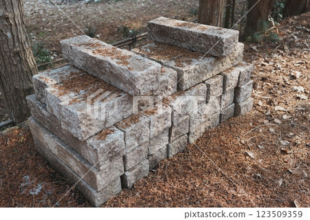 Many piled up gray stone pillars 123509359