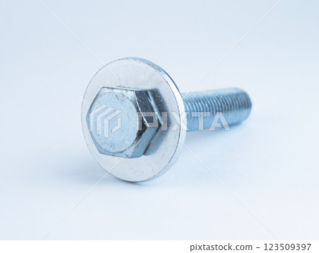 Bolts, washers, and nuts on surface 123509397