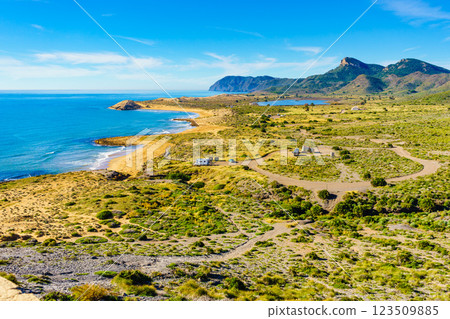 Spanish coast with caravan camping in the distance Spanish coast with caravan camping in the distance 123509885