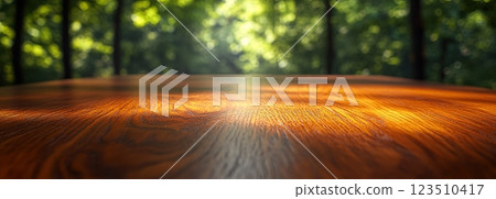 Wooden Table Surface with Sunset Blurry Cityscape and Nature Background, Warm Tones, and Soft Focus Lights Creating a Cozy Atmosphere for Relaxation 123510417