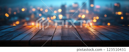 Wooden Table Surface with Sunset Blurry Cityscape and Nature Background, Warm Tones, and Soft Focus Lights Creating a Cozy Atmosphere for Relaxation Wooden Table Surface with Sunset Blurry Cityscape and Nature Background, Warm Tones, and Soft Focus Lights Creating a Cozy Atmosphere for Relaxation 123510431