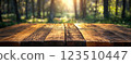 Wooden Table Surface with Sunset Blurry Cityscape and Nature Background, Warm Tones, and Soft Focus Lights Creating a Cozy Atmosphere for Relaxation 123510447