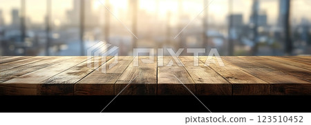 Wooden Table Surface with Sunset Blurry Cityscape and Nature Background, Warm Tones, and Soft Focus Lights Creating a Cozy Atmosphere for Relaxation Wooden Table Surface with Sunset Blurry Cityscape and Nature Background, Warm Tones, and Soft Focus Lights Creating a Cozy Atmosphere for Relaxation 123510452