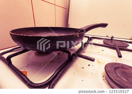 Dirty grubby gas stove in kitchen Dirty grubby gas stove in kitchen 123510527