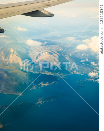 View from airplane flying over Norway. 123510541